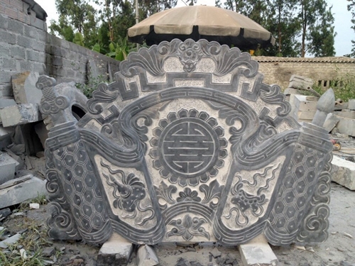 Thân cuốn thư chạm chữ thọ